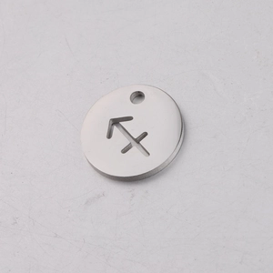 Detailed macro view of a 12mm stainless steel Sagittarius zodiac cutout charm pendant