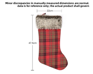 Detail of red plaid Christmas stocking with grey faux fur trim and dimensions 47.5x22cm