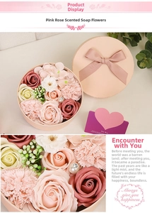 Detailed view of pink soap flower gift box with roses, carnations, pearls and a heart card