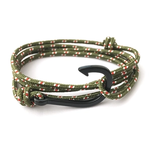 Close-up of military green woven nautical rope bracelet with a black fish hook clasp