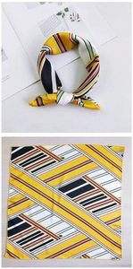 Detail of square silk scarf with geometric stripes and stylish knotted styling display