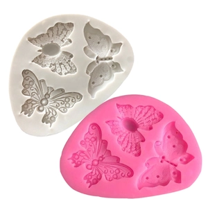 Macro view of butterfly silicone molds showing intricate texture for DIY baking