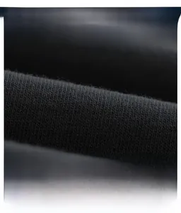 Primer plano de la textura de tela de punto negra de calidad para un vestido de lunares
