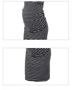 Close-up of ruched side seams and striped maternity dress texture for pregnant women