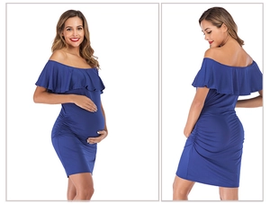 Detail view of maternity dress showing off-shoulder neckline and side ruched bodycon fit
