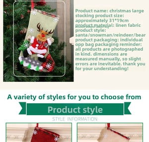 Detail view of large burlap Christmas stocking with 31x19cm dimensions and festive 3D patterns