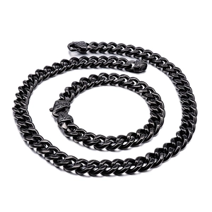 Polished black stainless steel Cuban chain necklace and bracelet set with engraved clasp