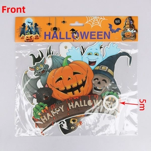 Macro detail of Halloween paper banner pack featuring pumpkin, ghost, and bat characters