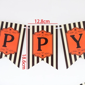 Detailed view of Halloween paper banner flags with stripes and orange shield patterns