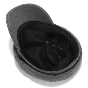Grey wool blend newsboy cap with stylish side chain detail on a white background