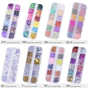 Macro shot of 12-grid nail art boxes with laser glitter flakes and aurora sequins set