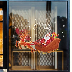 Christmas window sticker featuring Santa Claus on a reindeer sleigh with Merry Christmas text