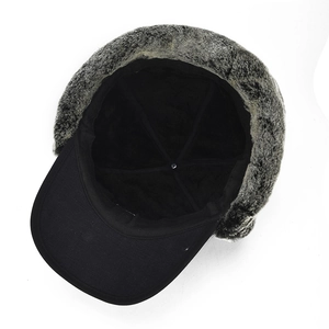 Men's winter trapper hat with ear flaps and thick grey faux fur lining in black fabric