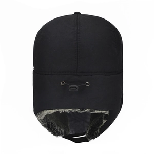 Men's winter aviator trapper hat with black windproof shell and warm faux fur ear flaps