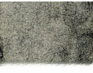 Detailed macro view of high-density gray-brown faux fur lining for winter earflap hats