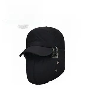 Detail of black winter trapper hat with gray faux fur lining and integrated face mask