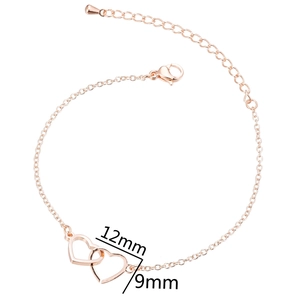 Elegant rose gold double heart bracelet for women with intertwined hollow heart pendants