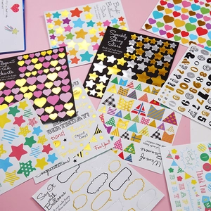Colorful decorative gold foil letter and number stickers for scrapbooking and DIY crafts