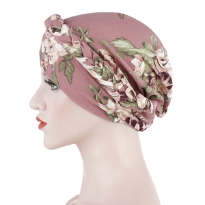 Floral print headscarf turban in dusty rose with braided trim on mannequin