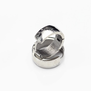 Polished silver stainless steel round hoop earrings with a wide minimalist geometric design