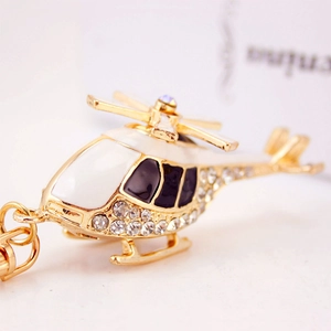 White and gold helicopter keychain with crystal rhinestones and enamel finish
