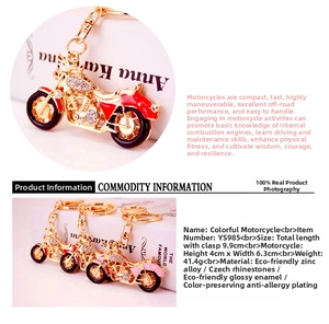 Detail view of motorcycle keychain dimensions showing a 4x6.3cm size and zinc alloy material