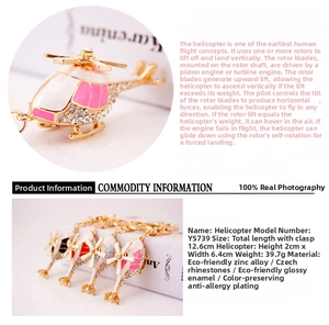 Macro shot of rhinestone-studded helicopter keychain details with enamel finish