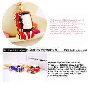 Detail view of red and blue zinc alloy car keychains with Czech rhinestones