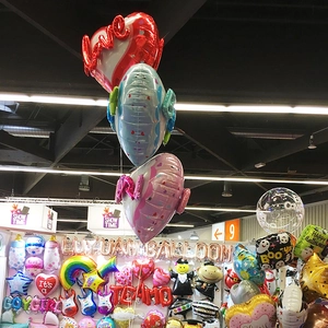 Detailed display of colorful aluminum foil balloons for birthday party and gender reveal