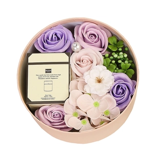 Pink round gift box with scented soap roses and eco-wax candle for Valentine's Day gift set