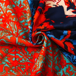 Ethnic style summer sun protection shawl with vibrant red and turquoise abstract patterns