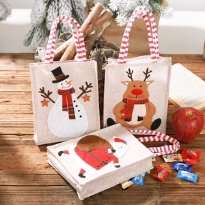 Three Christmas burlap gift bags featuring 3D Santa, Reindeer and Snowman with knit handles