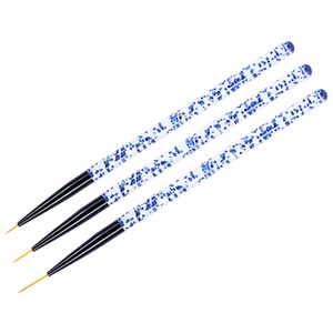 Three-piece nail art brush set with blue glitter handles and fine yellow bristles