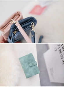 Detailed macro view of the soft matte texture and metal buckle on this women wallet