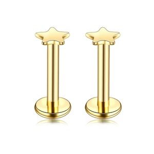 Detail of two gold star labret piercings with flat backs made of polished stainless steel