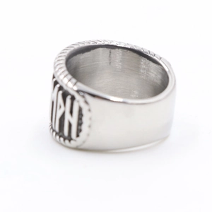 Detail view of silver Nordic Viking ring featuring relief PH lettering on polished band