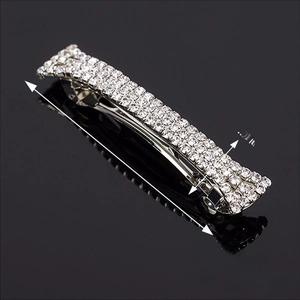 Detailed view of silver spring hair clip with AAA rhinestones measuring 7cm by 1.5cm
