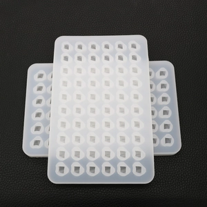 Close-up of 60-cavity rectangular silicone mold for DIY resin cubes and jewelry making