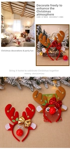 Detail of Christmas reindeer antlers headband with shiny bows and small metal bells