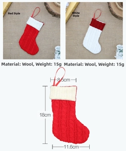 Detail showing cable knit pattern on wool Christmas stockings in red and white colors