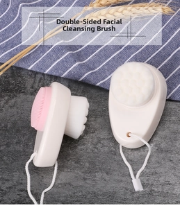 Double-sided facial cleansing brush with soft silicone bristles and dense fiber brush head