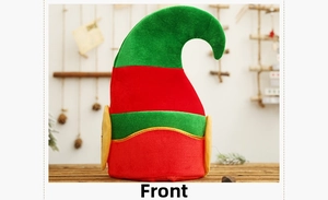 Close-up of a festive elf hat featuring red and green plush fabric and pointed ears
