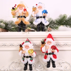 Set of four plush Santa Claus ornaments with colorful outfits on a festive mantle