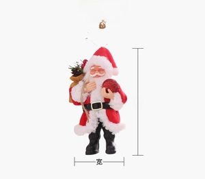 Detailed view of standing Santa Claus ornament with glitter ball and golden gift bag