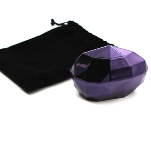 Purple diamond-cut foundation brush storage case with a black velvet drawstring pouch