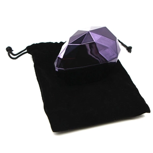 Metallic purple geometric makeup sponge case on a black velvet drawstring bag
