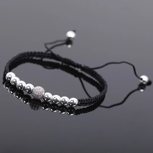 Adjustable hematite beaded rope bracelet with a micro-paved zircon center bead