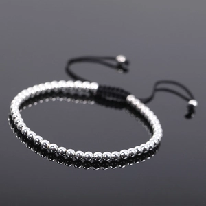 Adjustable hematite beaded rope bracelet with silver beads and woven drawstring knot