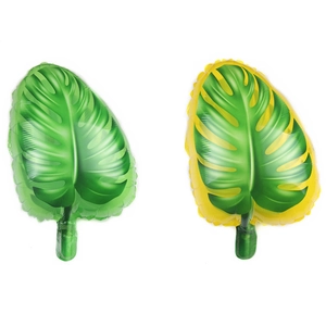 Detail of monstera leaf foil balloons in vibrant green and yellow for autumn party decor