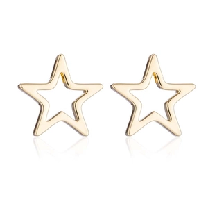 Minimalist gold hollow star stud earrings set in a sharp professional studio shot